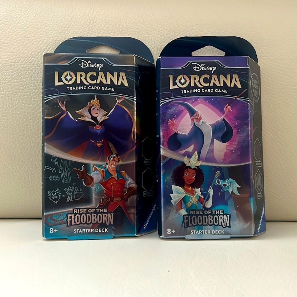 Lorcana TWO Starter Decks Rise of Floodborn Amber Sapphire and Amethyst Steel